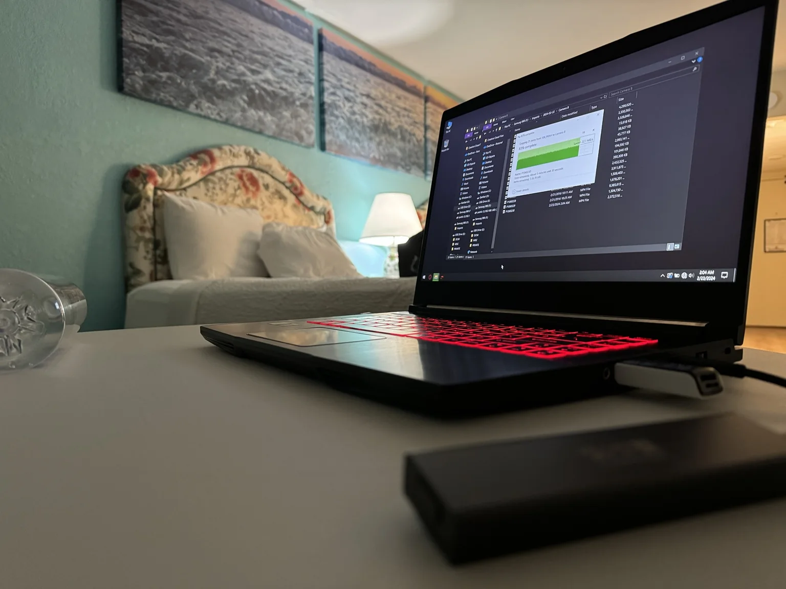 Laptop offloading footage in a hotel room