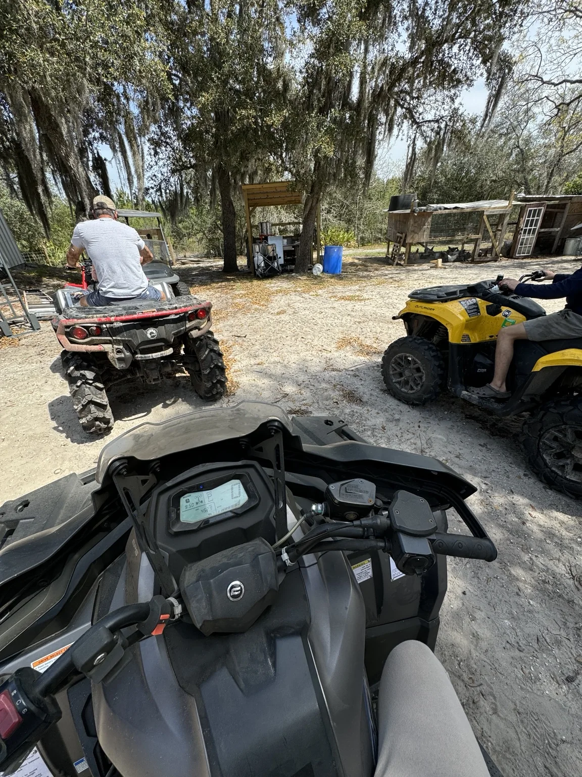 Following Toby through the homestead on ATVs