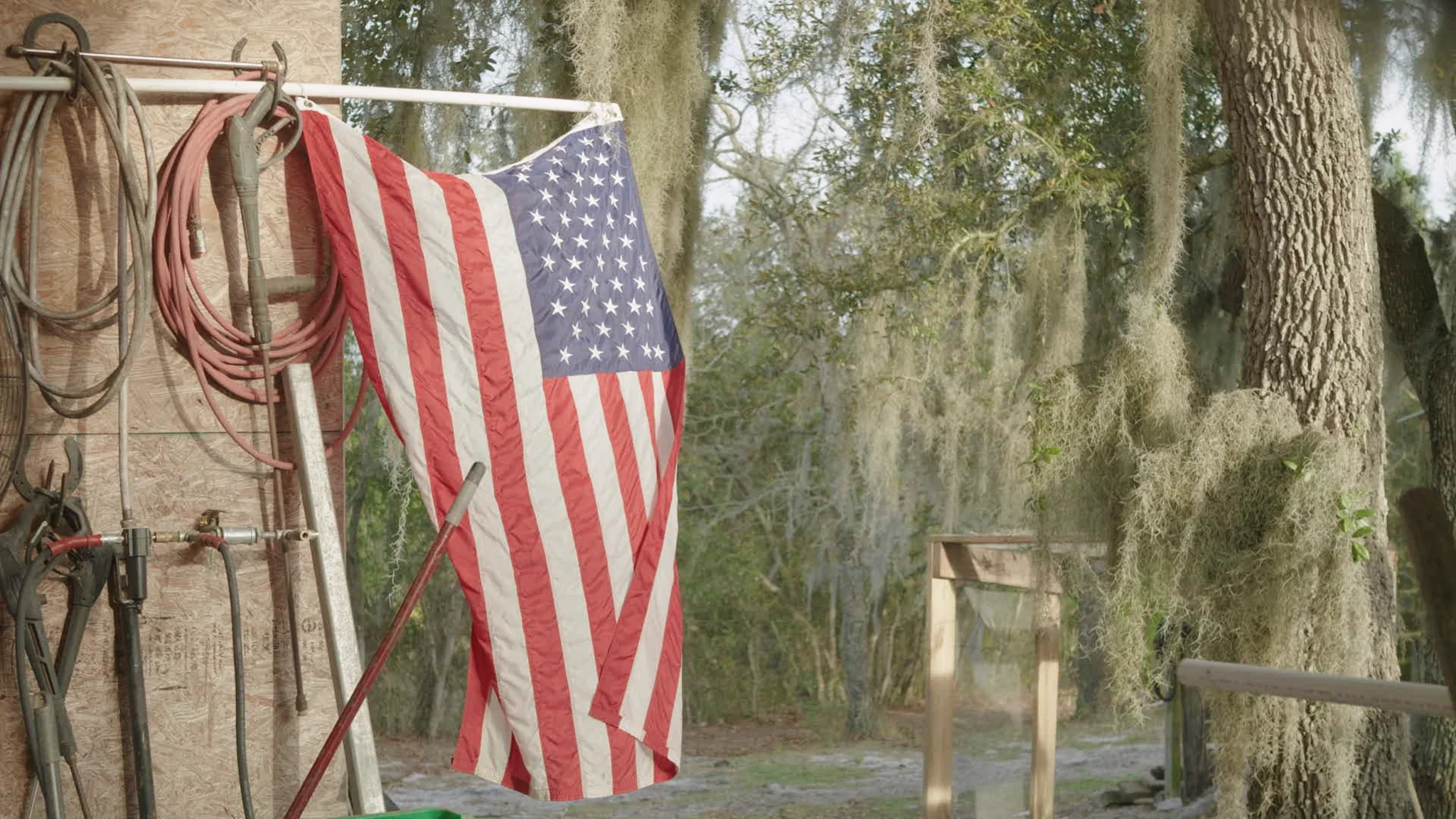 American flag and the landscape around Toby’s homestead